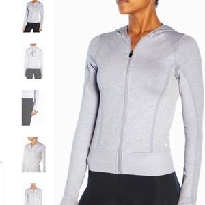 New Marika women's hooded zip up top with thumb holes